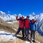 Trekking in Nepal- Colorful Rhododendron forest with Shining Mountains